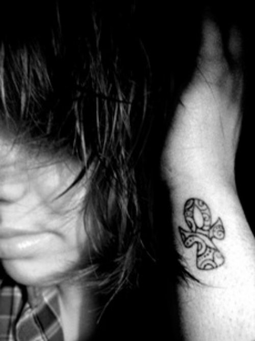 Girl With Ankh Tattoo On Left Wrist