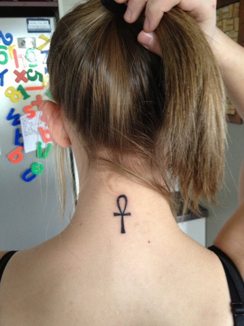 Awesome Girl Showing Her Ankh Tattoo On Nape