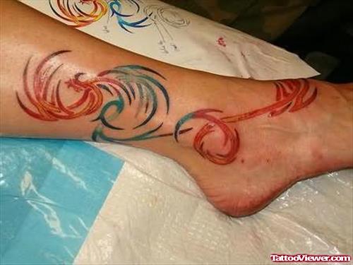 Beckoning Phoenix Tattoo On Ankle