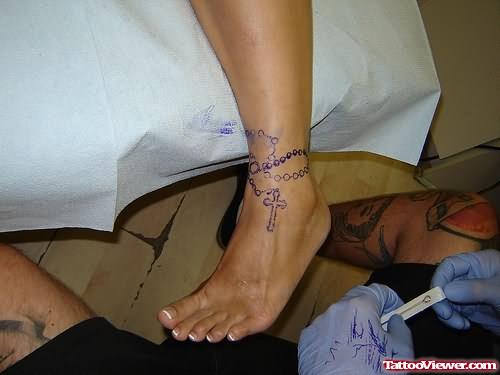 Blue Ink Ankle Tattoo