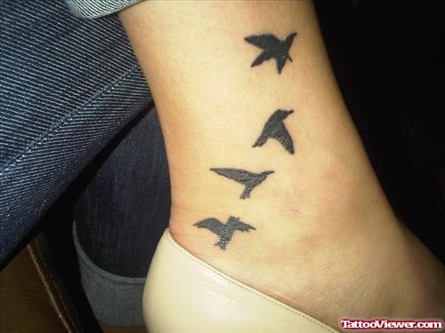 Black Flying Birds Ankle Tattoo
