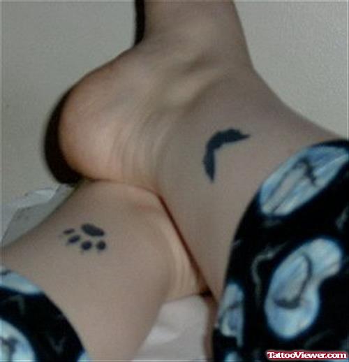 Paw Prints and Bird Ankle Tattoo