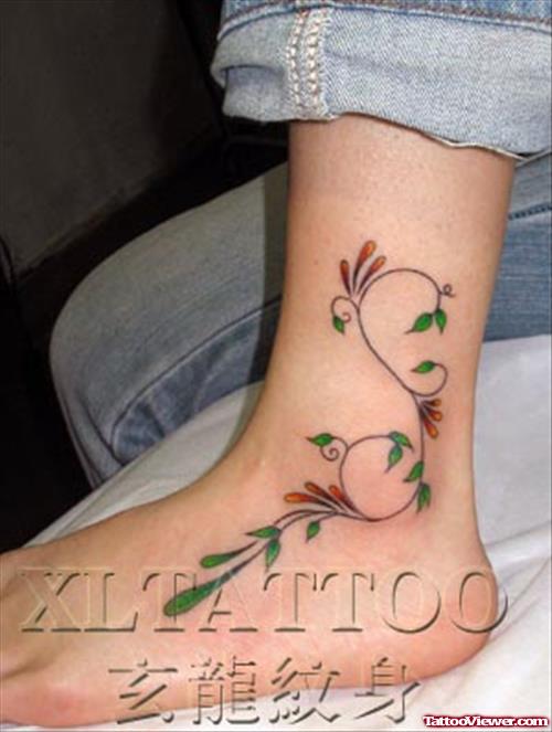 Amazing Color Ink Left Ankle Tattoo