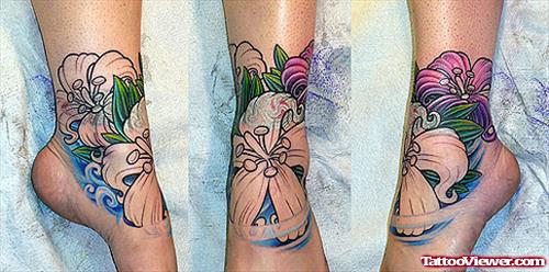 Awesome Colored Flowers Ankle Tattoo