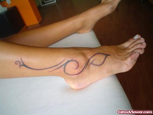 Amazing Tribal Ankle Tattoo