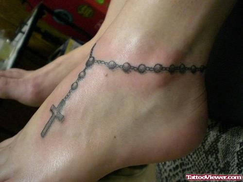 Best Grey Ink Cross Rosary Ankle Tattoo