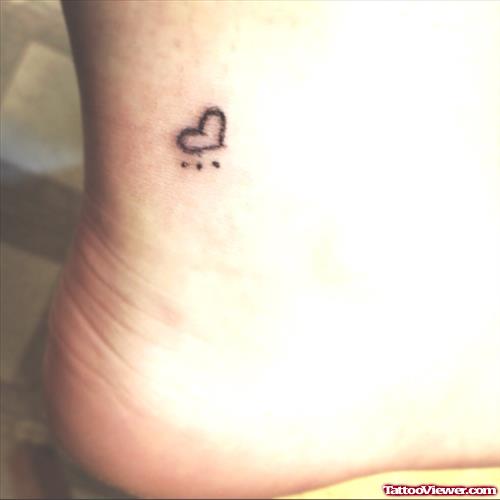 Awesome Small Black Heart Ankle Tattoo