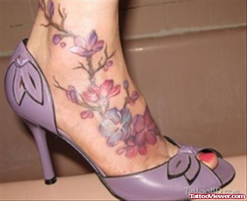 Colored Flowers Right Ankle Tattoo