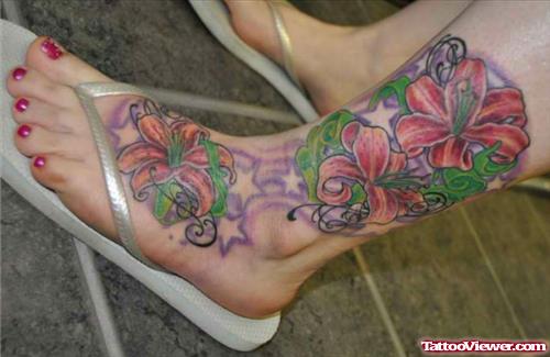 Awesome Colored Flowers Ankle Tattoo For Girls
