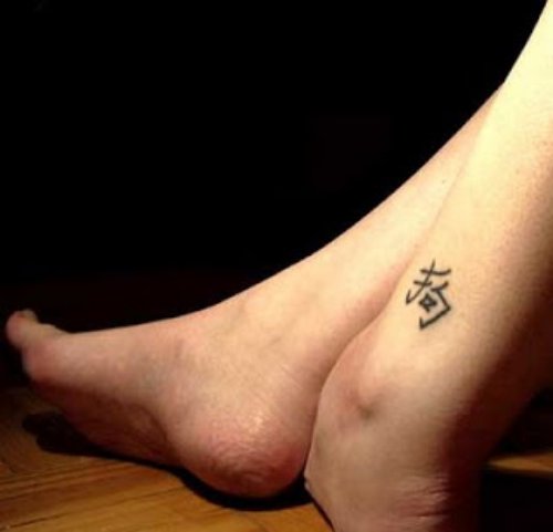 Attractive Chinese Symbol Ankle Tattoo