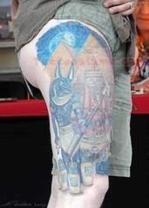 Colorful Egyptian God Anubis Tattoo On Right Thigh