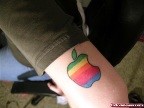 Apple Tattoo On Left Bicep