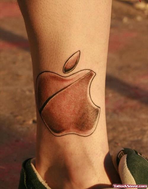 Attractive Grey Ink Apple Tattoo On Leg