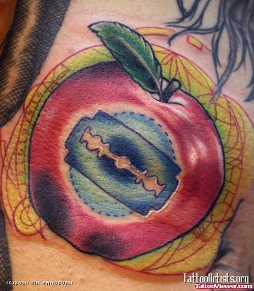 Razor Blade In Red Apple Tattoo