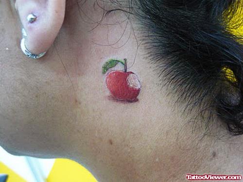 Cool Small Apple Tattoo On Side Neck