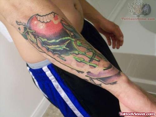 Colored Apple Tattoo On Man Right Sleeve