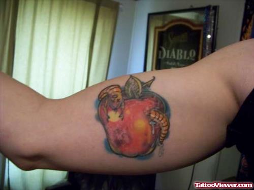 Apple Tattoo on Right Bicep