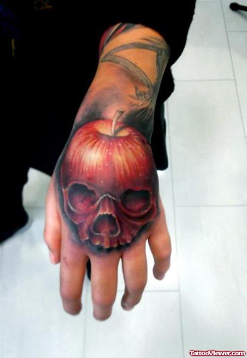 Red Ink Apple Tattoo On Left Hand
