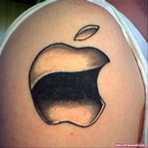 Grey Ink Apple Tattoo On Man Left Shoulder