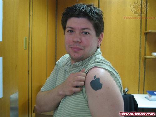 Black Apple Tattoo On Shoulder