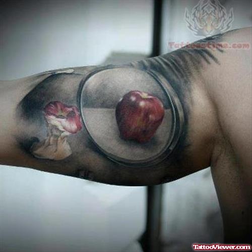 Awesome Apple Tattoo On Muscle