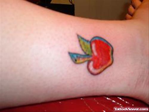 Beautiful Red Apple Tattoo On Ankle
