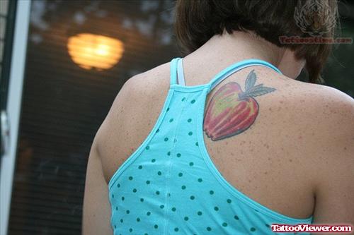 Red Apple Tattoo On Girl Back