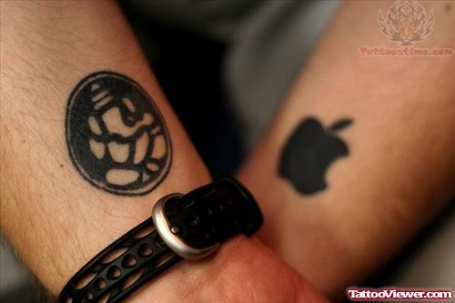 Lord Ganesh And Apple Logo Tattoo