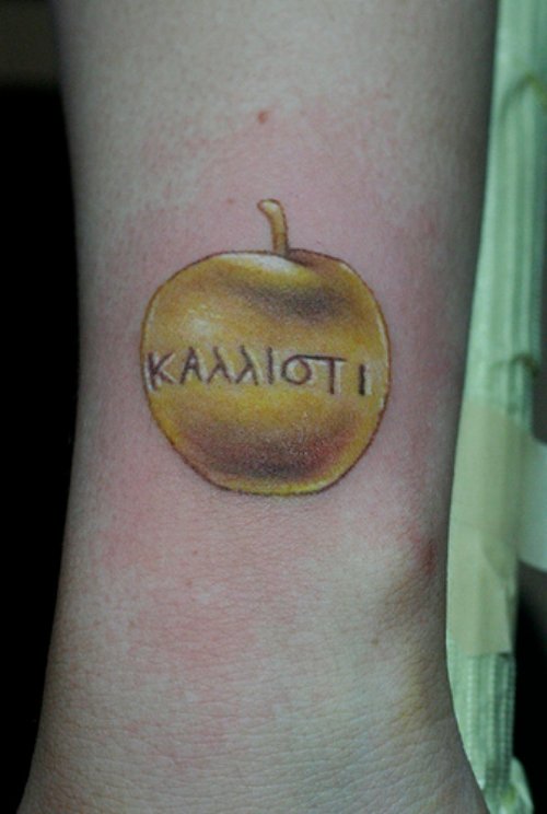 Golden Apple Tattoo On Arm