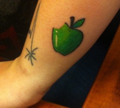 Green Ink Apple Tattoo on Arm