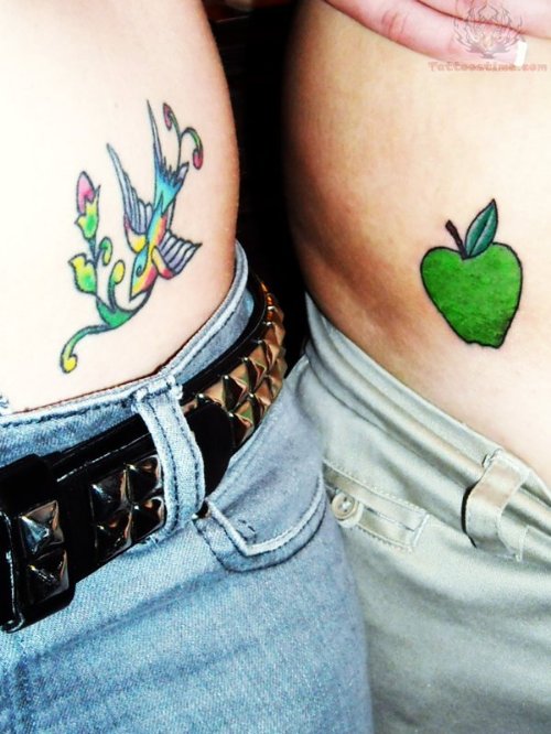 Bird And Apple Tattoo On Hips