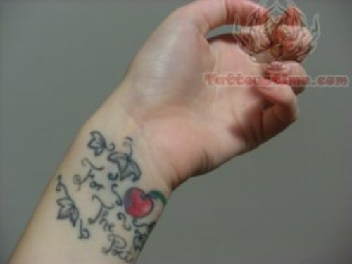 Poets Apple Tattoo On Wrist