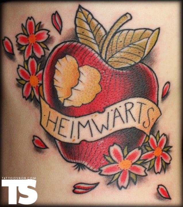 Heimwarts Banner And Red Apple Tattoo