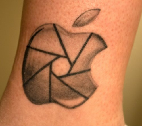 Camera Shutter Apple Tattoo On Wrist