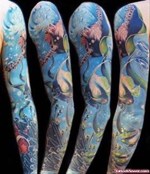 Blue ink Aqua Tattoos On Sleeve