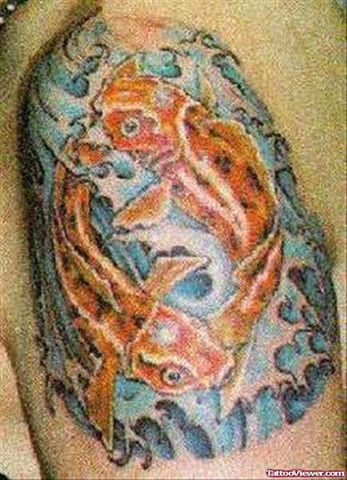Colored Aqua Fish Tattoos On Bicep
