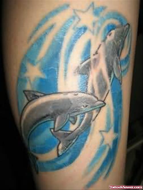 Amazing Blue Ink Dolphins And Stars Aqua Tattoo