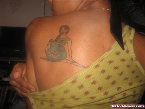 Awesome Aquarius Tattoo On Girl Back Shoulder