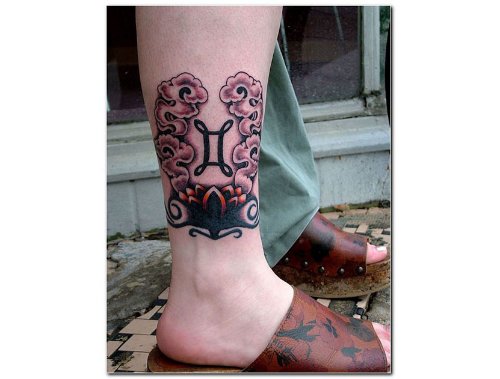 Gemini And Aquarius Tattoo On Leg