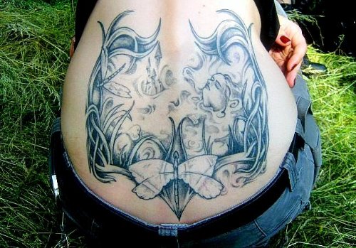 Grey Ink Aquarius Tattoo On Girl Lowerback