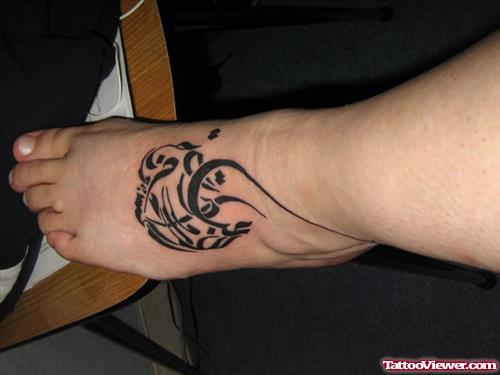 Arabic Tattoo On Left Foot