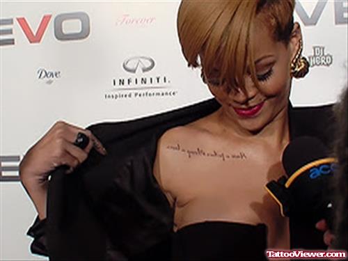 Rihanna With Arabic Tattoo On Collarbone