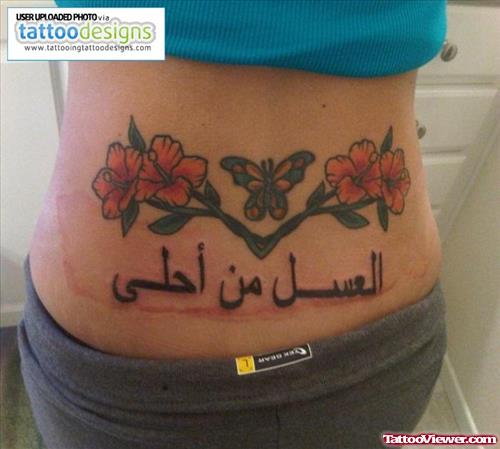 Flowers Butterfly And Arabic Tattoo On Lowerback