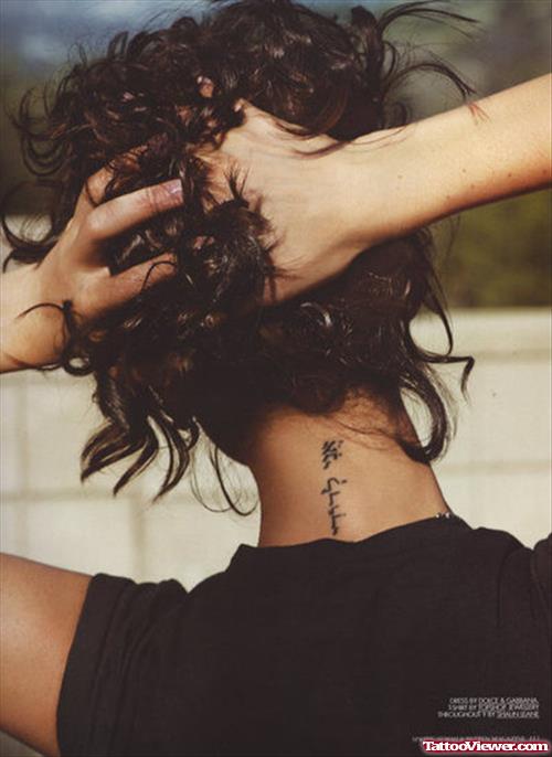 Arabic Tattoo On Girl Nape