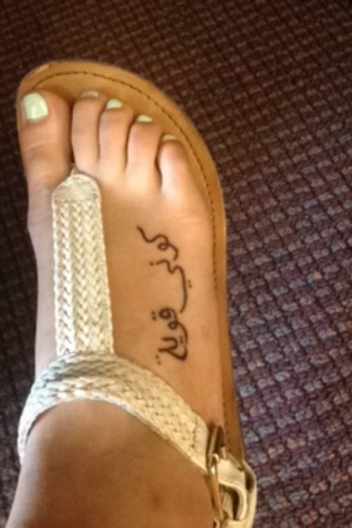 Arabic Tattoo On Right Foot