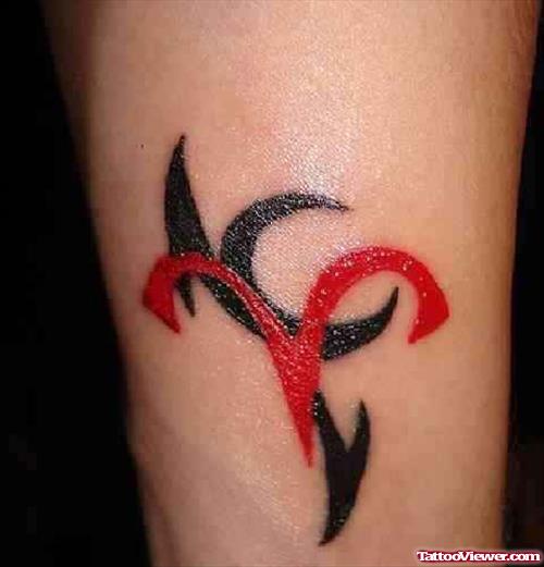 Red And Black Tribal Aries Tattoo