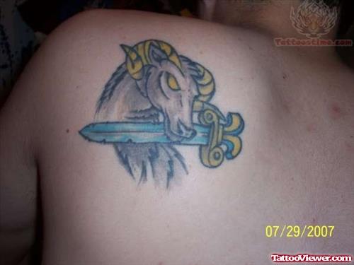 Dagger And Goat Head Aries Tattoo On Back Shoulder