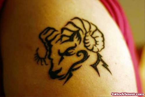 Black Tribal Aries Tattoo On Left Shoulder