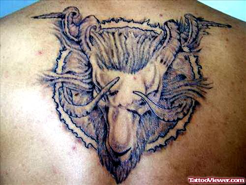 Grey Ink Aries Tattoo On Upperback