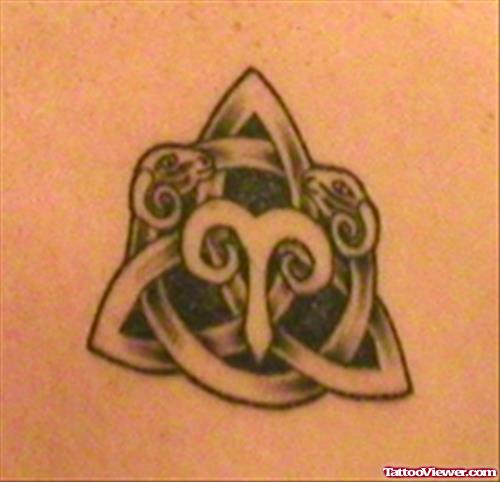 Grey Ink celtic Knot And Aries Head Tattoo